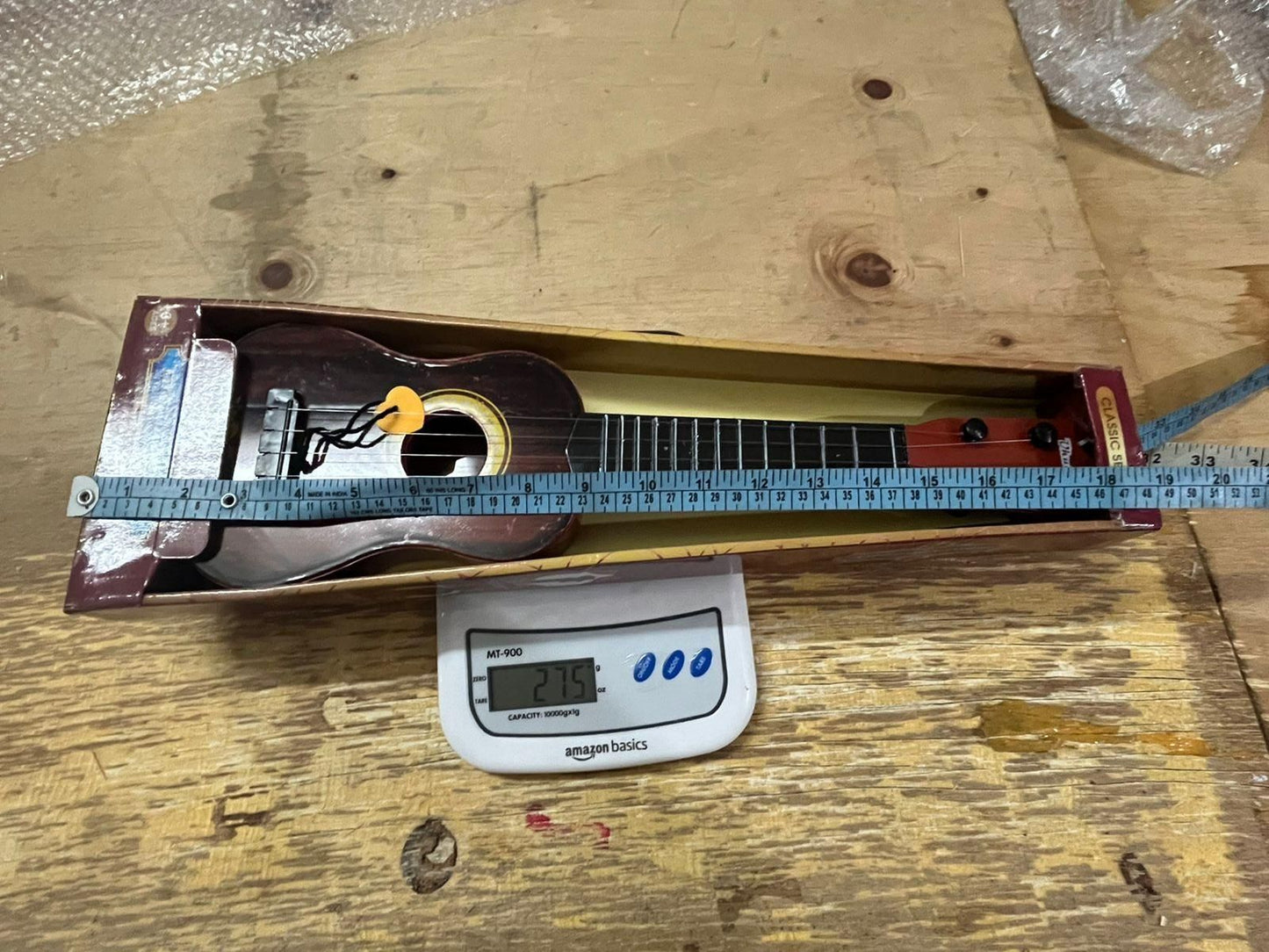 Mini Wooden-Finish Kids Guitar – 4-String Musical Toy with Clear Sound (Plastic Build)